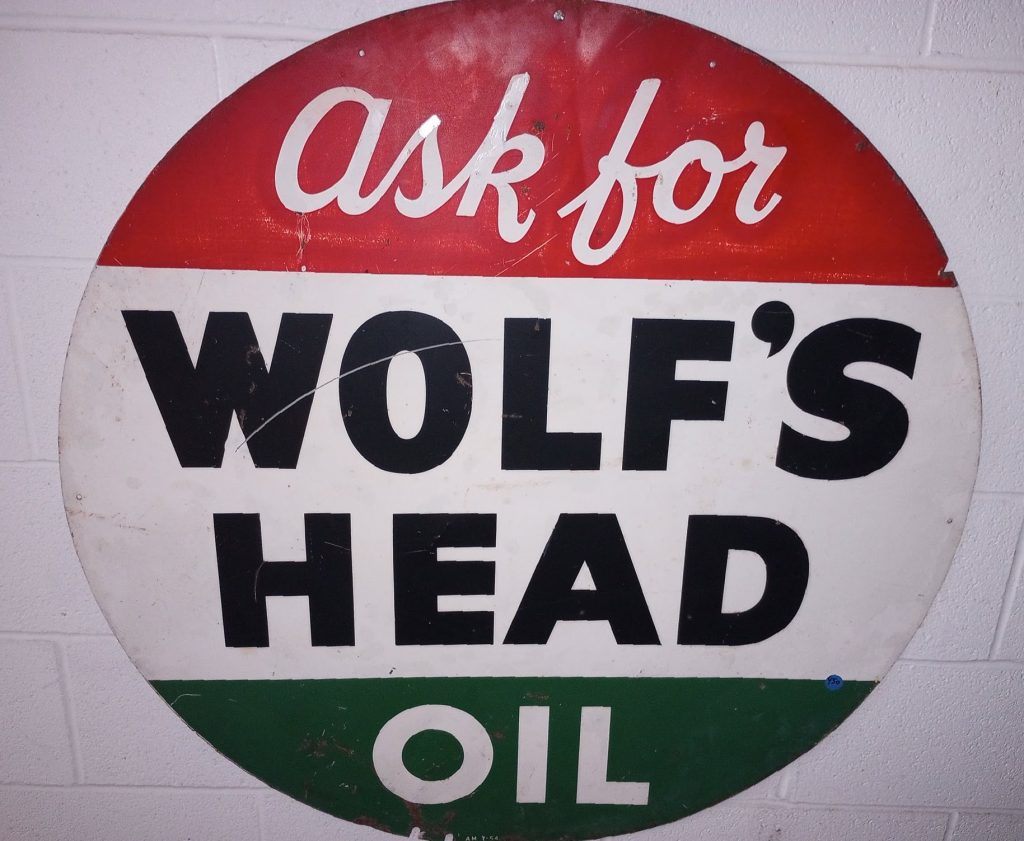 Wolf's Head Oil Sign
