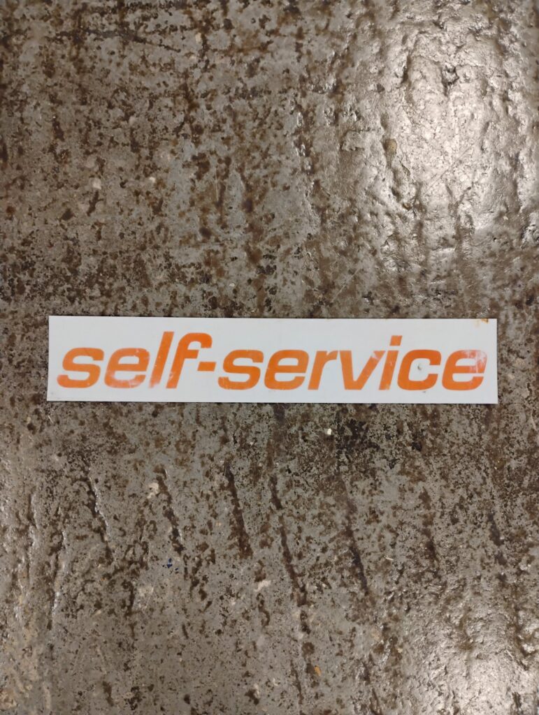 Self-Service Gas Pump Plate